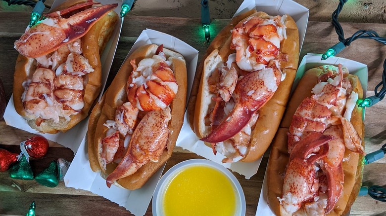 Four lobster rolls with warm butter