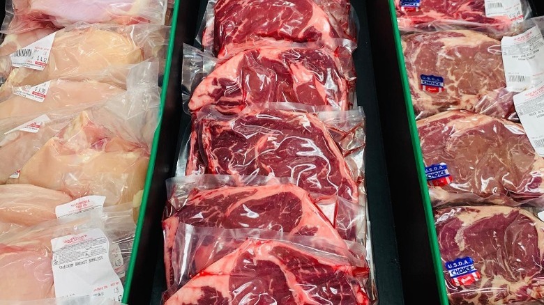 Meat in plastic on display