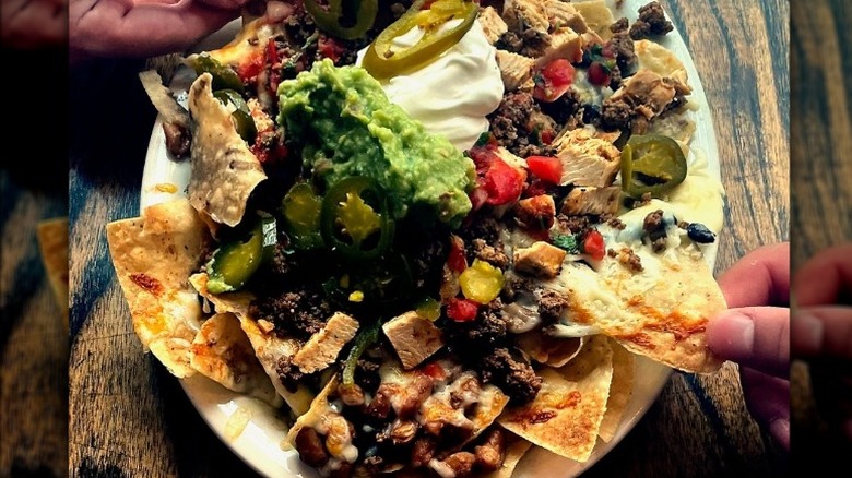 Nachos, chicken and toppings