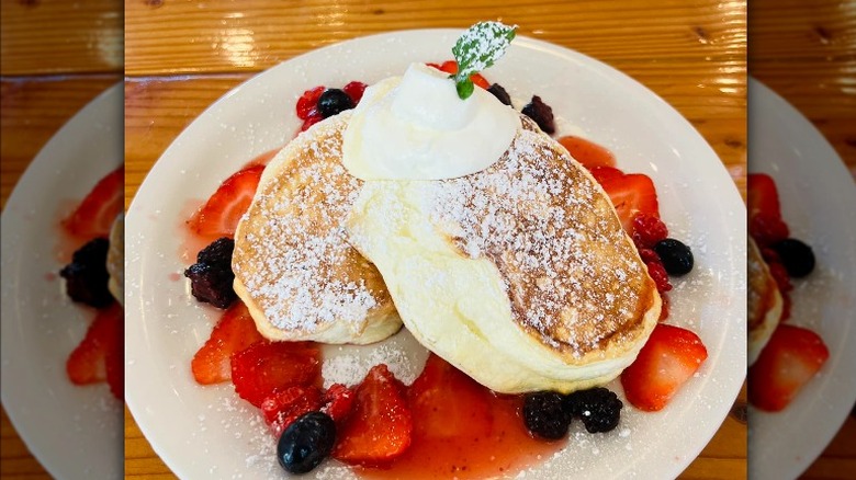 Pancakes with cream and fruit