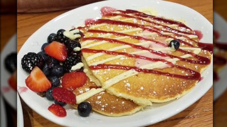 Pancakes with sauce and berries