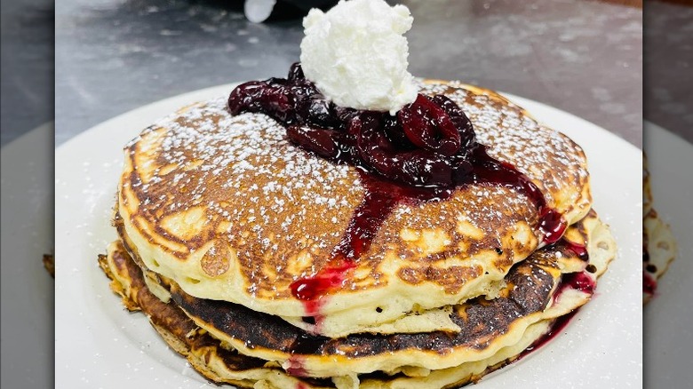 Cherry pancakes with cream 