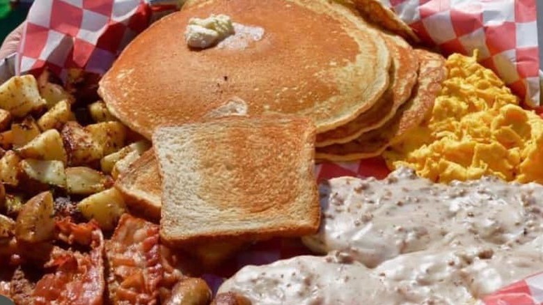 Huge breakfast platter with pancakes 