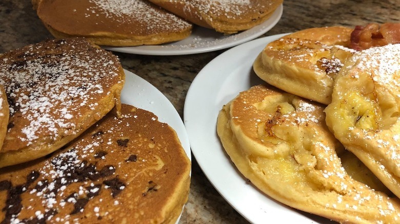 Pancakes topped with powdered sugar 