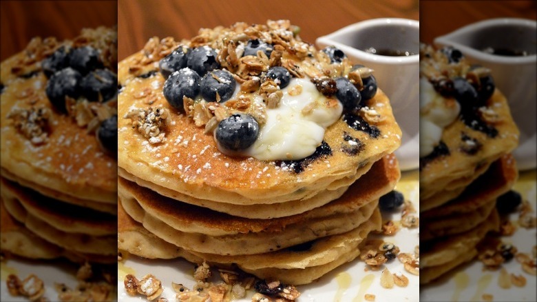 Blueberry pancakes topped with granola