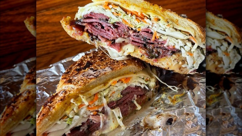 chipotle pastrami sandwich cut in half