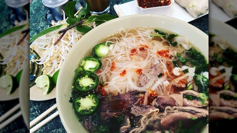 beefy pho with thai coffee and spring rolls