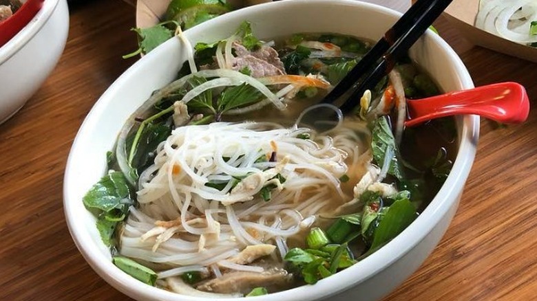 bowl of pho with lots of noodles