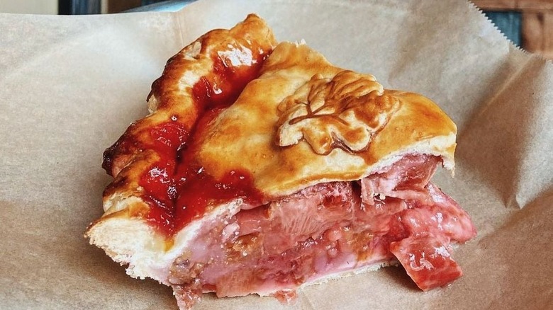 strawberry rhubarb pie on brown paper