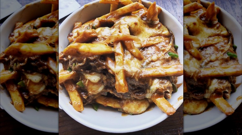 poutine on white plate