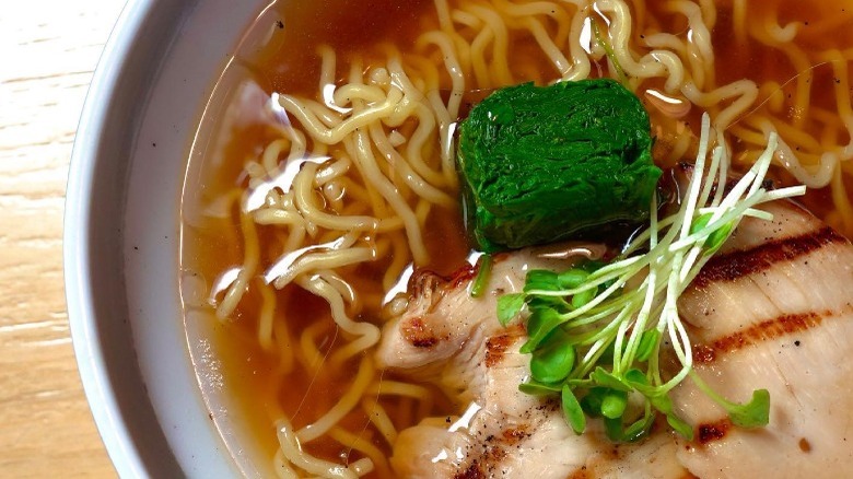 noodles in broth with green paste 