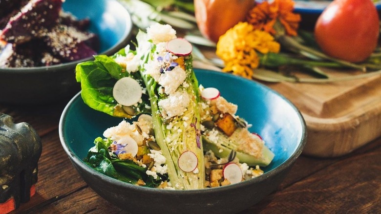 Salad in blue bowl