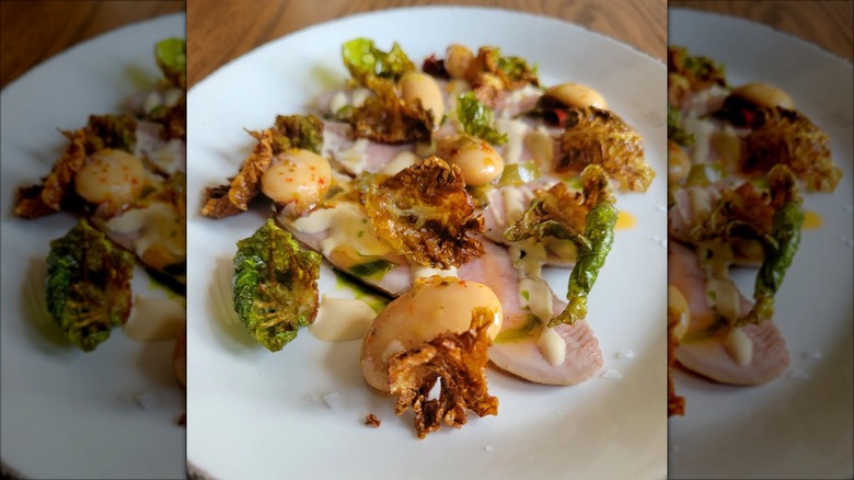 Fish and brussels sprouts on plate