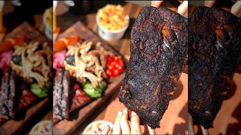 Person holding beef rib