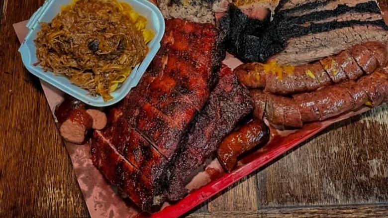 A plate of Bodacious Ribs and other meats.