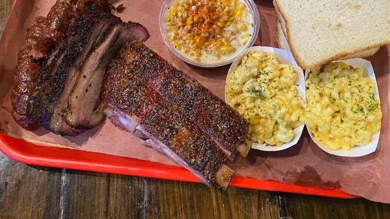 Terry's Black BBQ Ribs with some toast, mac and cheese, and other side.