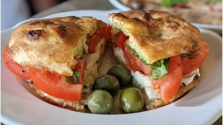 Mozzarella, tomato, basil sandwich 