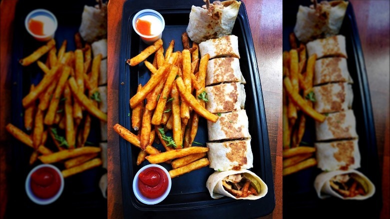 Plate of shawarma with fries