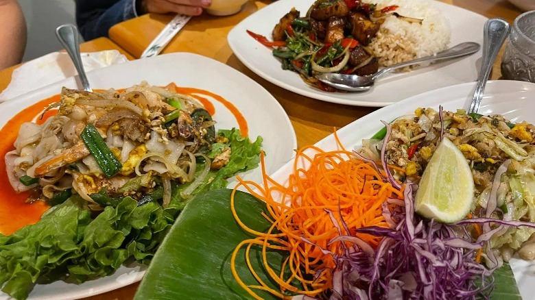 Three plates of Thai food