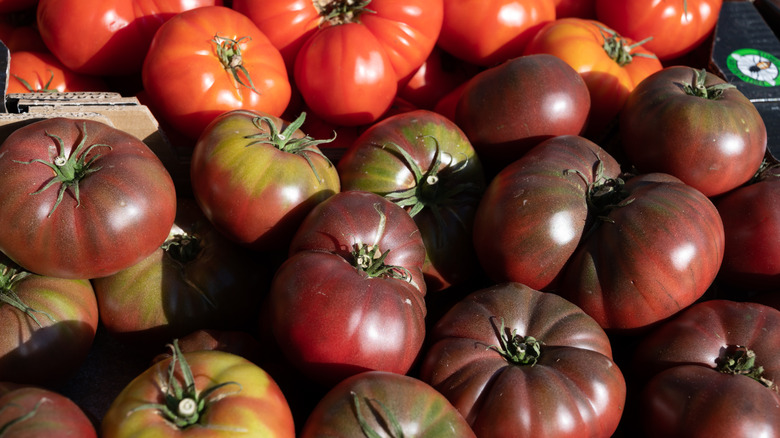 piles of heirloom tomatoes