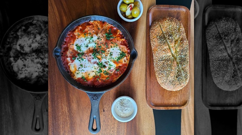 pan of shakshuka and bread 