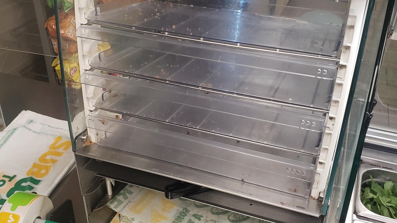 empty Subway cookie display case