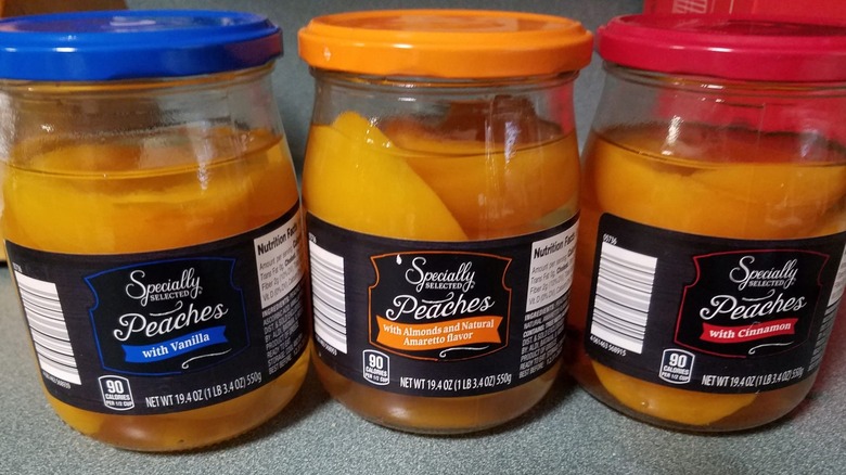 three jars of peaches