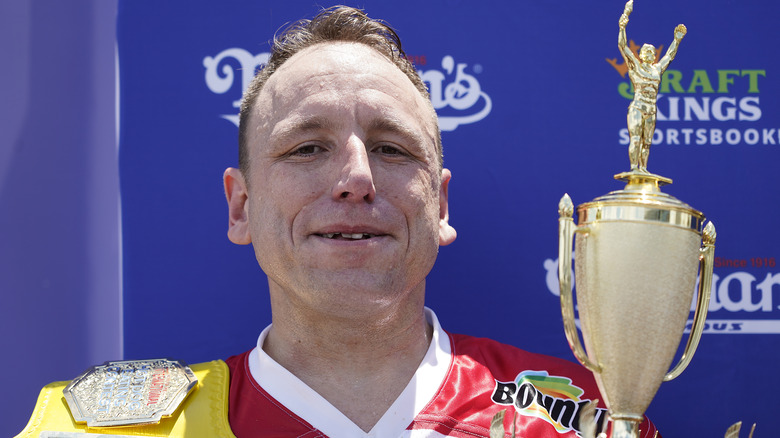 Joey Chestnut with trophy