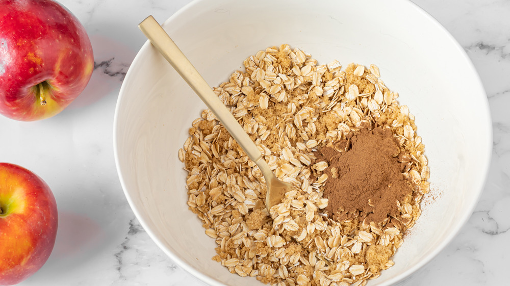 mixing muffin topping for apple cinnamon muffins