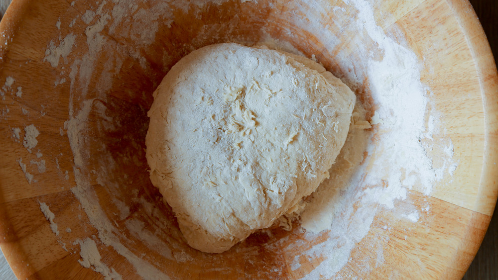 bagel recipe dough in a wooden bowl