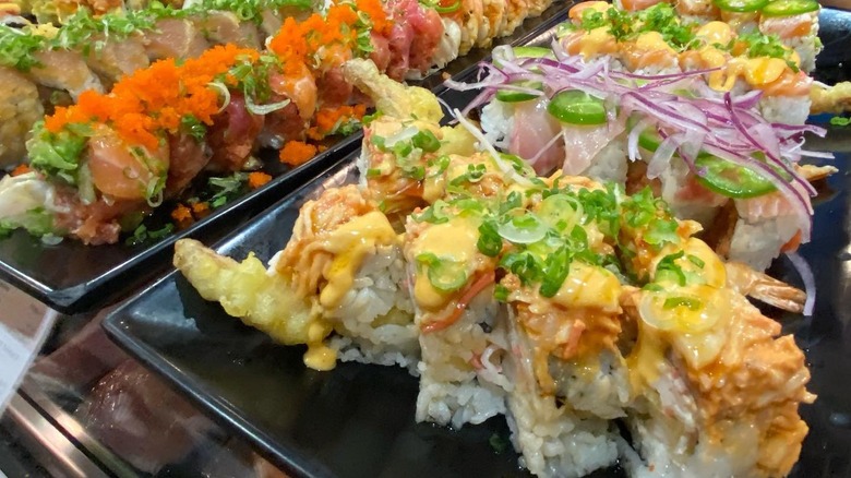 Several rolls of unique sushi creations