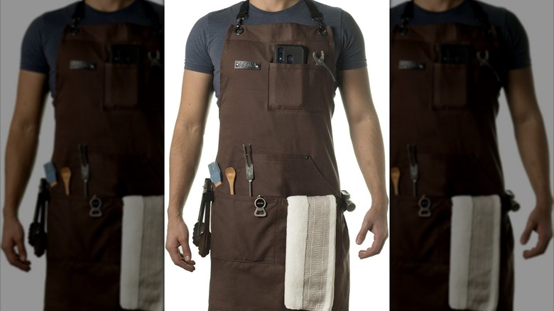 brown apron with pockets for various cooking tools