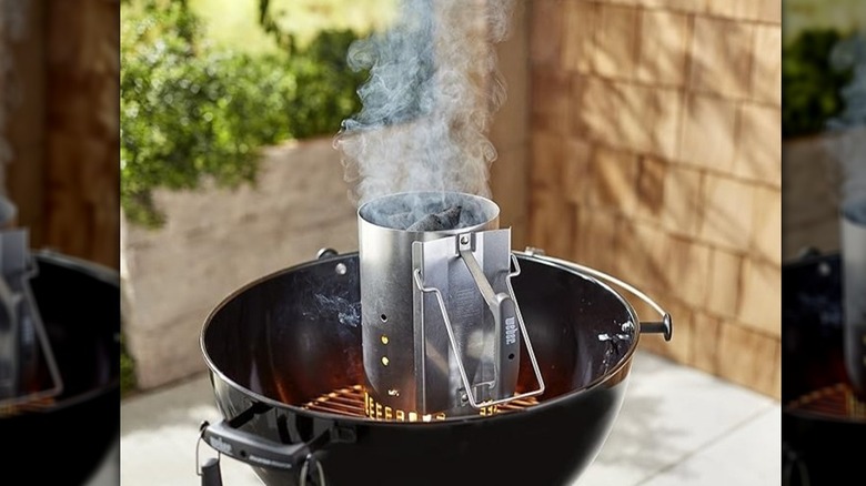 smoking chimney starter on grill