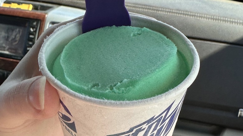 Hand holding cup of Baja Blast Gelato