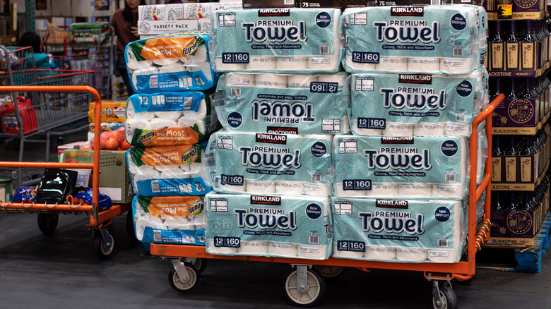 cart of Kirkland paper towels 