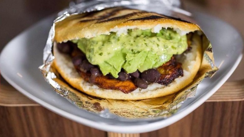 plantain black bean and avocado arepa