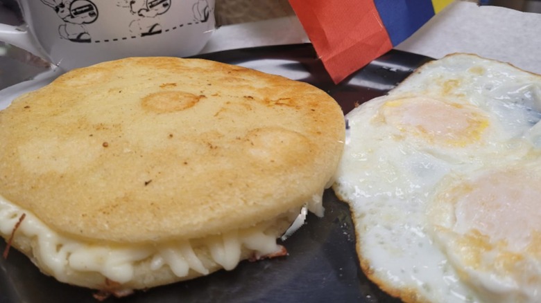 cheese arepa and fried eggs