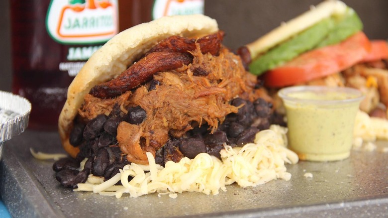 arepa pabellón and jarritos