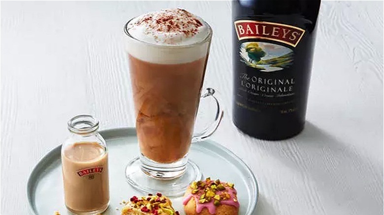 Baileys latte with bottle of liqueur