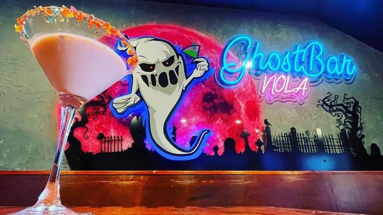 Ghost Bar's sign on wall 