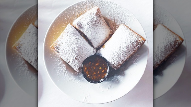 Beignets on white plate