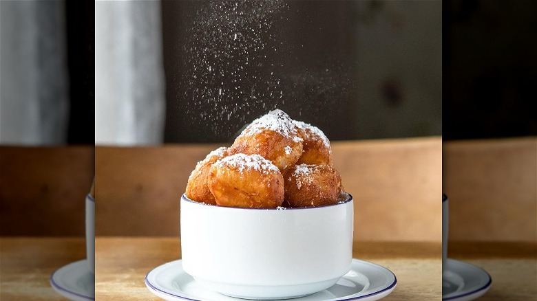Beignets in glass bowl