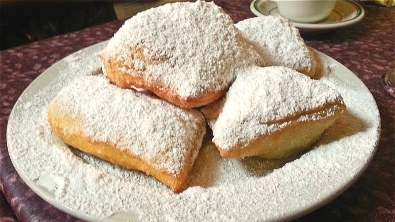 Beignets on white plate