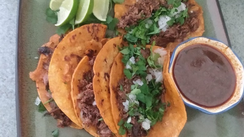 Birria tacos with consomé