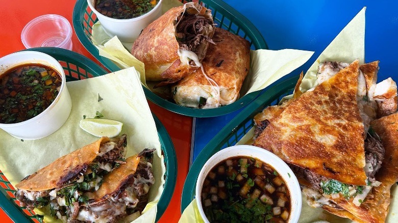 Birria tacos, burrito, and quesadilla