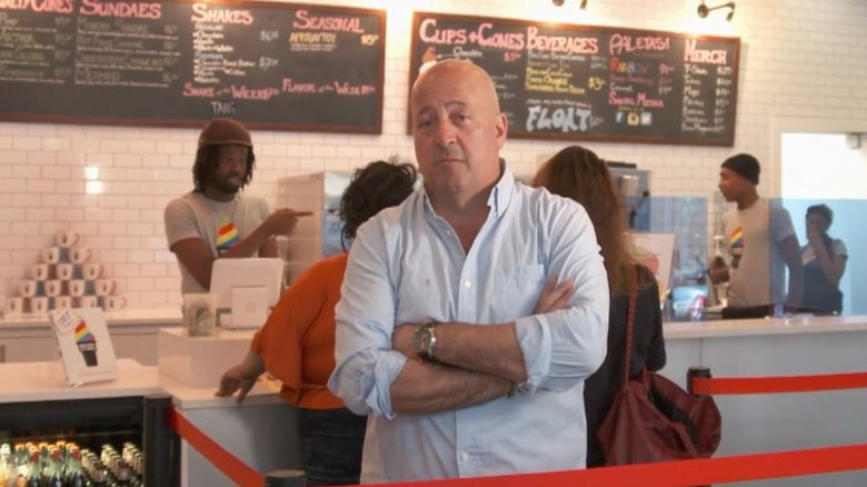 Andrew Zimmern with arms crossed