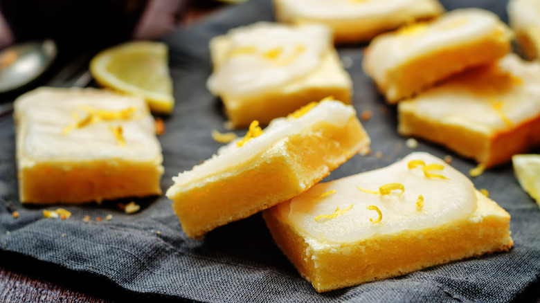 lemon bars on black fabric