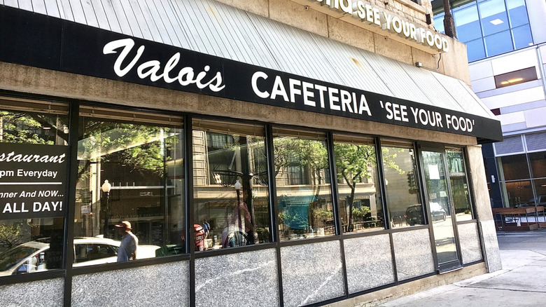 Storefront of Valois on sunny day