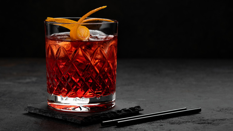 Classic Negroni on slate coaster