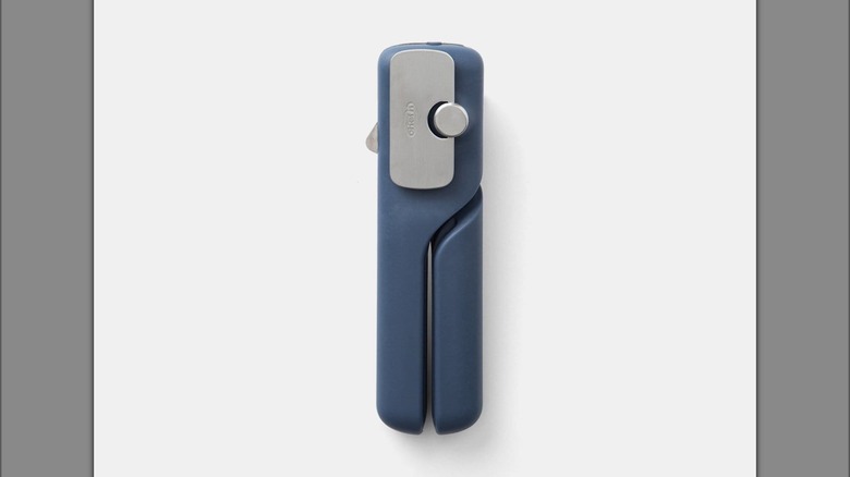 A blue Chefn can opener on a white background